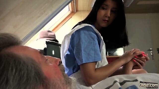 Nurse Takes Care Of Patient